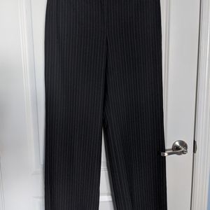 Ann Taylor Signature fit, just below waist